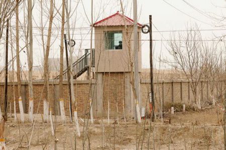 A security guard at a detention center in Yarkant County, Xinjiang, China, last year. Delays to the U.N. report about abuses in the region prompted fierce pushback from rights groups.Credit...Ng Han Guan/Associated Press