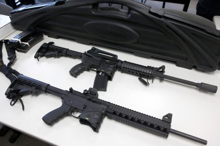 FILE PHOTO: A Bushmaster semi-automatic assault rifle (top) and a Smith & Wesson semi-automatic rifle are turned in during a gun buyback event at the New Haven Police Academy in New Haven, Connecticut, December 22, 2012.  REUTERS/ Michelle McLoughlin