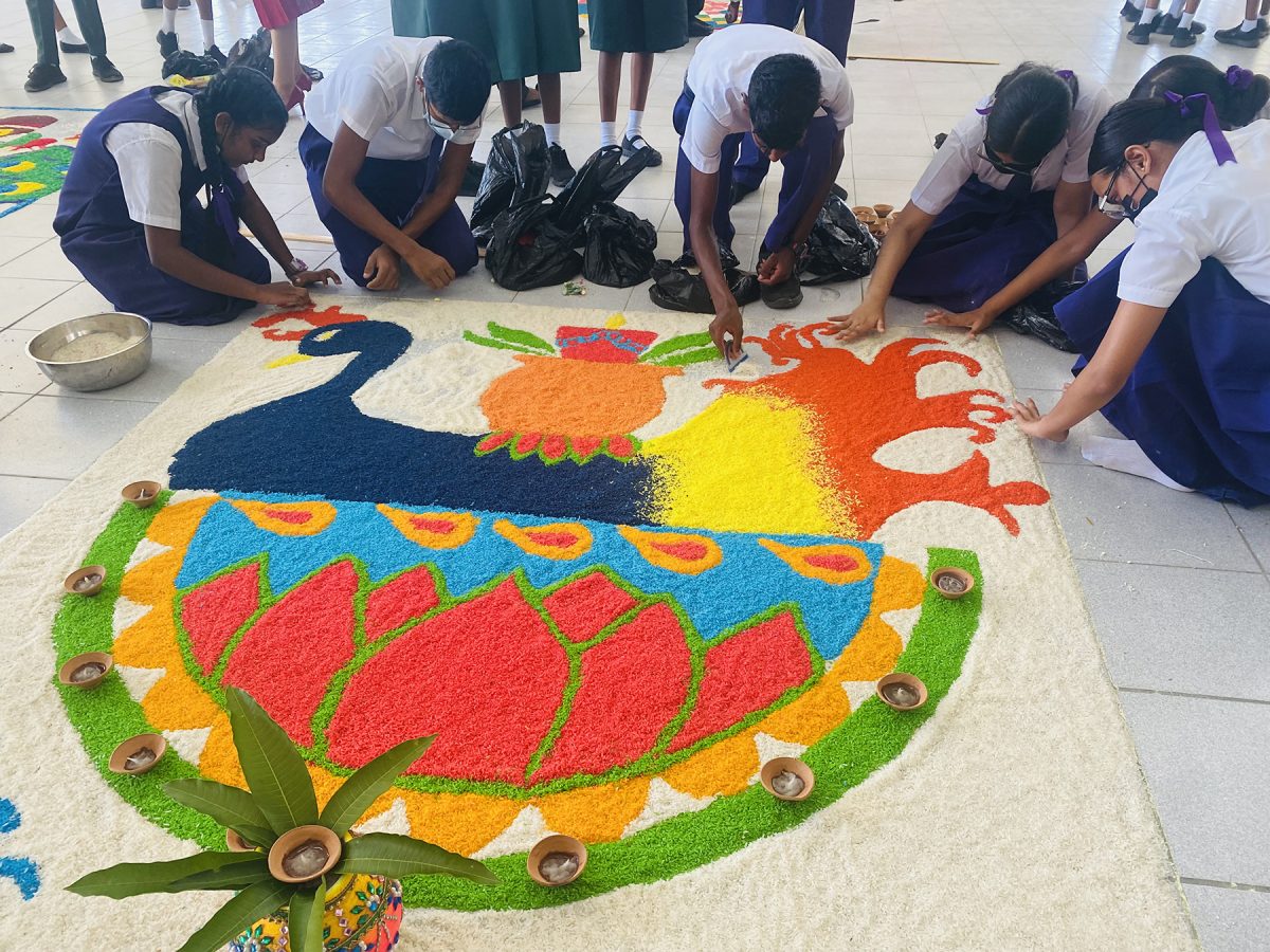 Students of Abram Zuil Secondary making their rangoli