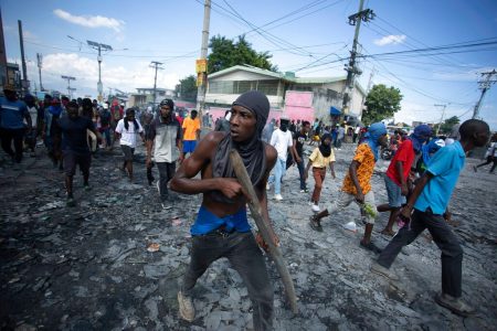 Haiti has ground to a halt since a coalition of gangs blocked its main fuel terminal. (AP pic)