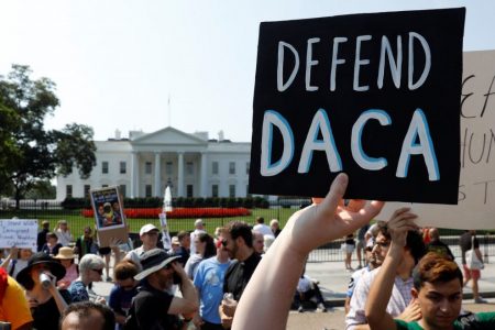 Deferred Action for Childhood Arrivals supporters demonstrate near the White House in Washington Sept. 5.

