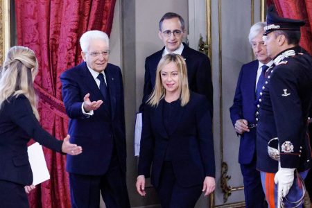 Sergio Mattarella welcomes Giorgia Meloni as she arrives for the swearing in Rome, on Oct. 22. Photographer: Fabio Frustaci/AFP/Getty Images