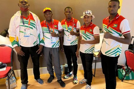 Guyana’s boxing contingent arrived in Asunción, Paraguay yesterday for the ongoing South American Games. From left are
coaches, Terrence Poole, and Gregory Cort who are pictured with boxers, Desmond Amsterdam, Keevin Allicock and Colin Lewis