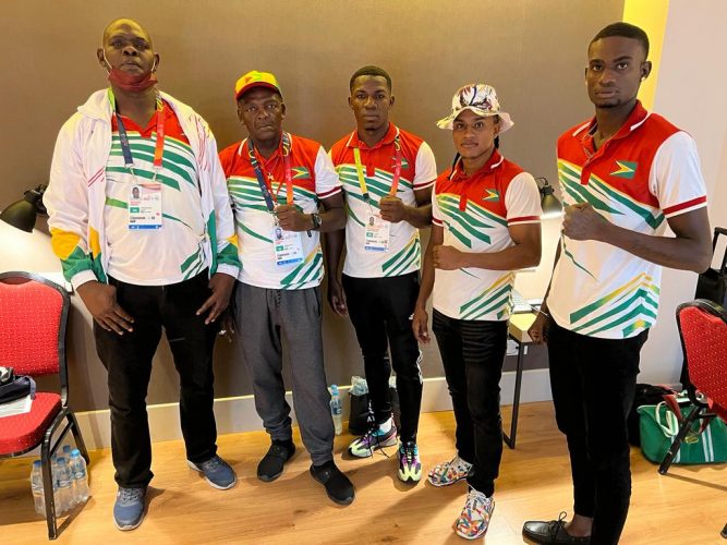 Guyana’s boxing contingent arrived in Asunción, Paraguay yesterday for the ongoing South American Games. From left are
coaches, Terrence Poole, and Gregory Cort who are pictured with boxers, Desmond Amsterdam, Keevin Allicock and Colin Lewis