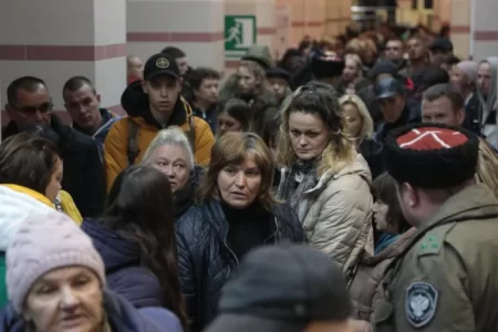 People arriving from Kherson wait for further evacuation inside the Dzhankoi's railway station in Crimea on Oct 21, 2022. (Photo: AFP)