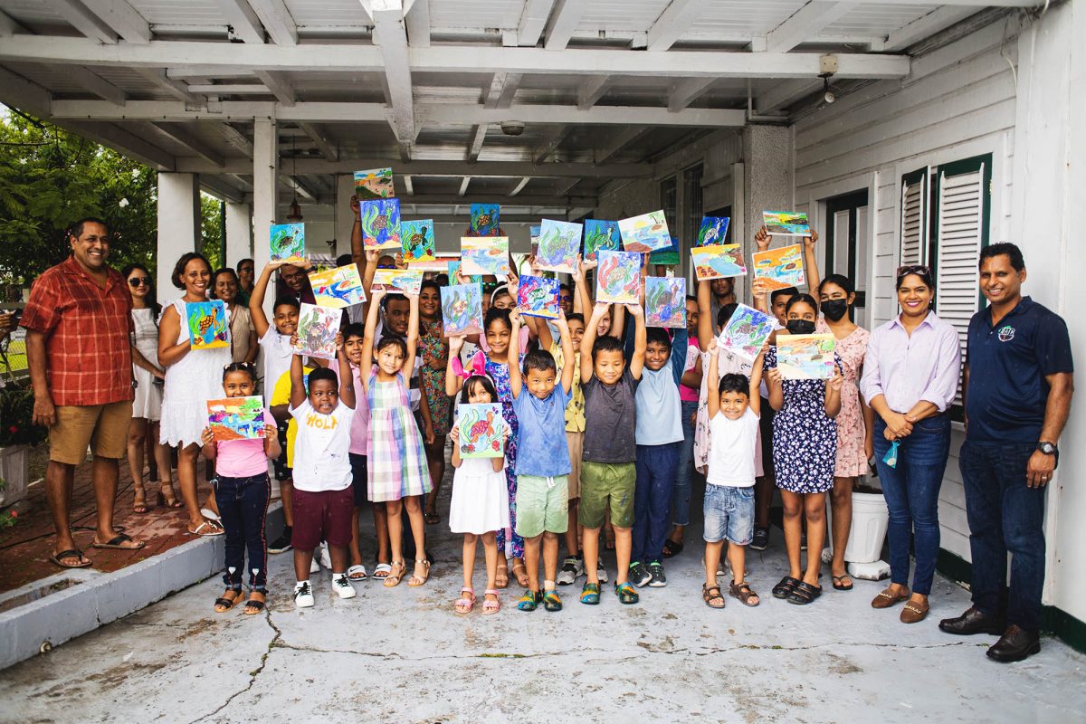 The participants of the paint mixer with their finished works (EMC Foundation photo)