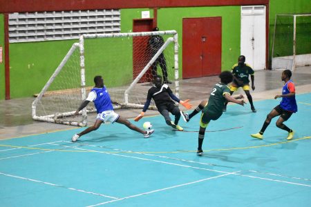 A scene from the Alexander Village (green) and Mocha clash in the MVP Futsal Championship at the National Gymnasium, Mandela Avenue
