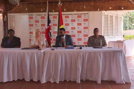 President Irfaan Ali (second from right and British High Commissioner Jane Miller (third from right) at this morning's press conference.