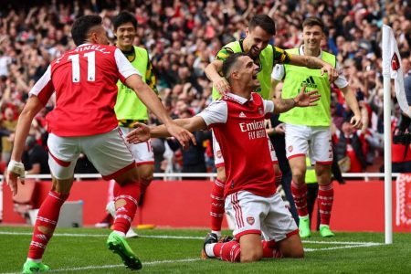 Arsenal’s Granit Xhaka celebrates scoring their third goal with Fabio
Vieira and Gabriel Martinelli REUTERS/David Klein
