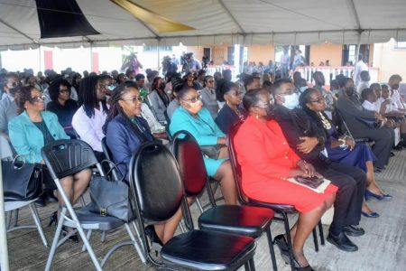 NIS employees at the anniversary observance