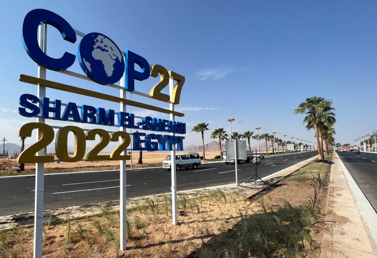 FILE PHOTO: View of a COP27 sign on the road leading to the conference area in Egypt’s Red Sea resort of Sharm el-Sheikh town as the city prepares to host the COP27 summit next month, in Sharm el-Sheikh, Egypt October 20, 2022. REUTERS/Sayed Sheasha/File Photo