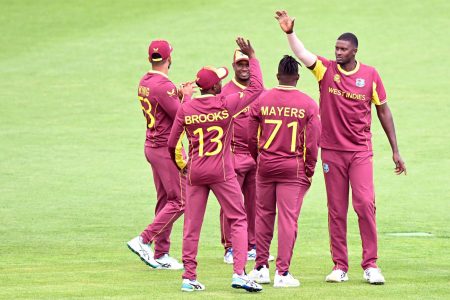 All-rounder Jason Holder (far right) is confident West Indies can bounce
back and keep their ICC T20 World Cup hopes alive.
