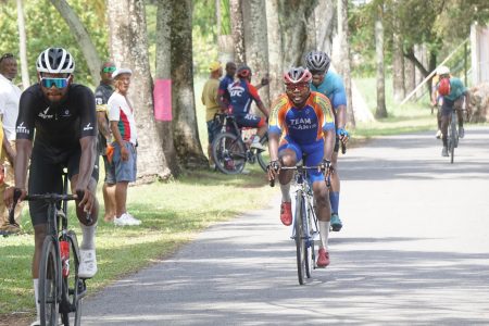 Jamual John who avoided the crash by starting the sprint, tamely crossed the line ahead of Kemuel Moses and Marlon Williams who joined him on the podium. (Emmerson Campbell photo)