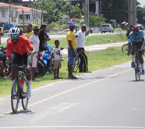 Jamual John bested a star-studded field to take the top honors of the feature16-lap event of the first annual Randolph ‘Duckie’ Singh Memorial race on the outer circuit of the National Park yesterday. (Emmerson Campbell photo)  