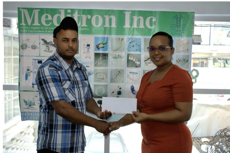 Avinash Persaud alongside Meditron Procurement Director Ronette Mitchell.