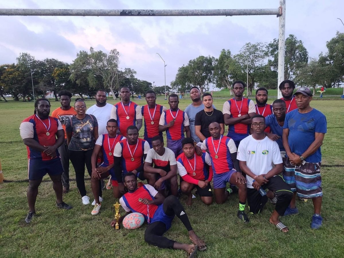 The Police Falcons outfit pose with their spoils on Sunday at the National Park. 