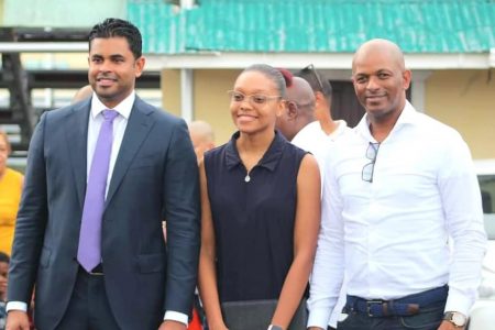 From left, Sports Minister Charles Ramson Jr., Olympian Chelsea Edghill and GTRTA president Godfrey Munroe