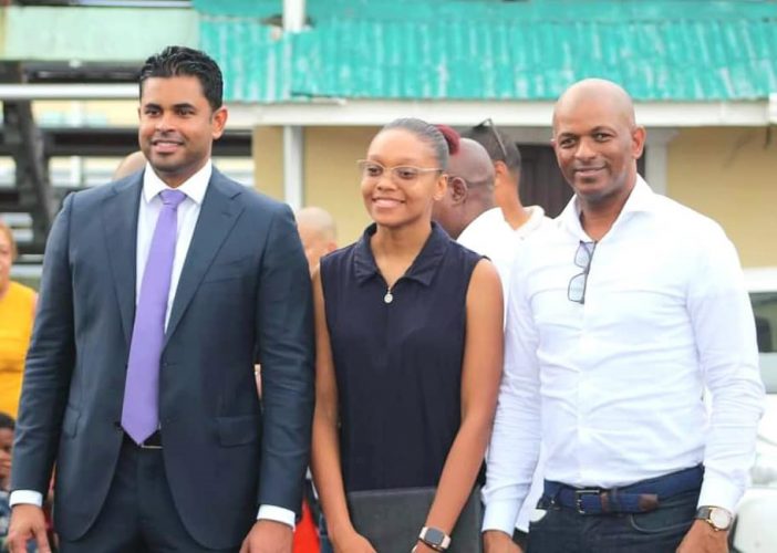 From left, Sports Minister Charles Ramson Jr., Olympian Chelsea Edghill and GTRTA president Godfrey Munroe