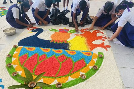 Students of Abram Zuil Secondary making their rangoli