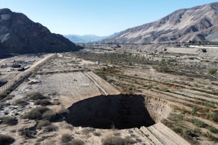 A sinkhole that was exposed last week has doubled in size, at a mining zone close to Tierra Amarilla town, in Copiapo, Chile, August 7, 2022. REUTERS/Johan Godoy