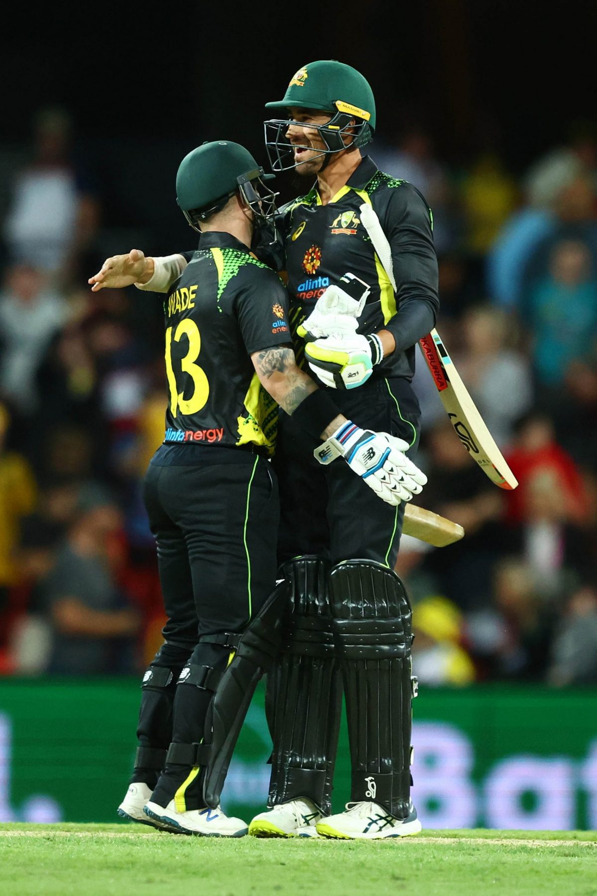 Australia’s Mitchell Starc and Matthew Wade celebrate their
team’s three wicket triumph yesterday. (Photo courtesy Twitter)