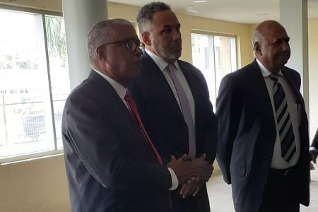 The three Commissioners at the Ashmins building yesterday. From left are Justices Stanley John, Godfrey P. Smith and Carl Singh 