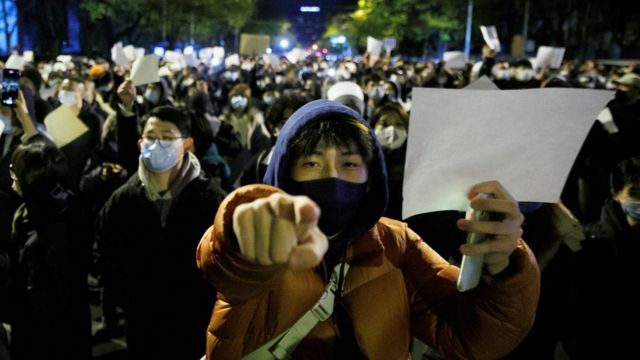 Demonstrators have held up sheets of white paper as a way to protest against censorship