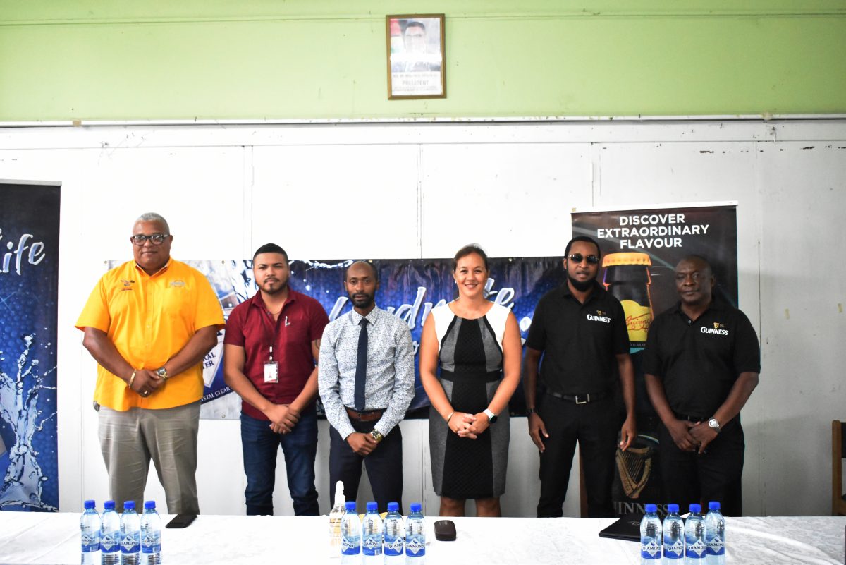 Members of the launch party for the 18th edition of the
Diamond Mineral Water International Indoor Hockey
Festival pose for a photo opportunity. They are (from left) to right Allan Newark; Kristhoff Henry, Commercial Manager of TLC Guyana; Larry Wills, Diamond Mineral Water Brand Manager; Tricia Fiedtkou, Vice-President of the GHB; Guinness Brand Manager Jeoff Clement and Banks DIH Limited Communications Director Troy Peters.
          
