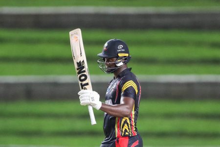 Guyana Harpy Eagles Romario Shepherd acknowledging crowd reaching his vital half century enroute to his 74