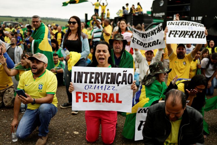 People attend a protest over Brazil's President Jair Bolsonaro's defeat in the presidential run-off election, in Anapolis, Goias state, Brazil, November 2, 2022 Reuters