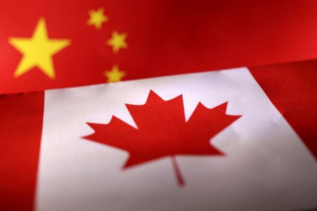 Printed Chinese and Canada flags are seen in this illustration, July 21, 2022. REUTERS/Dado Ruvic/Illustration