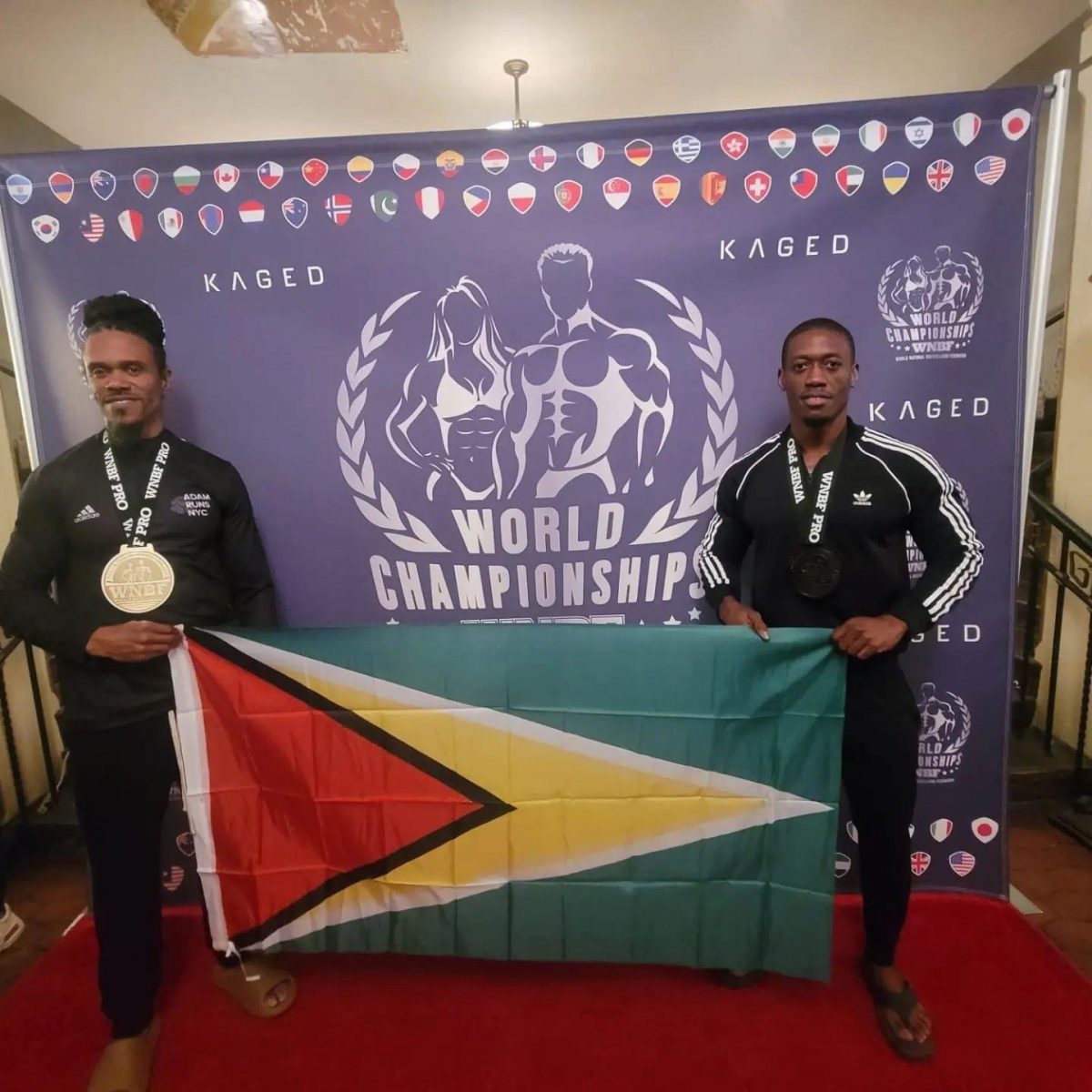 Decorated bodybuilder, Kerwin Clarke (right) and Master’s Rawle Green pose with the Golden Arrowhead on Sunday following the World Natural Bodybuilding Federation (WNBF) World Championship which was staged in Los Angeles, California, USA.

