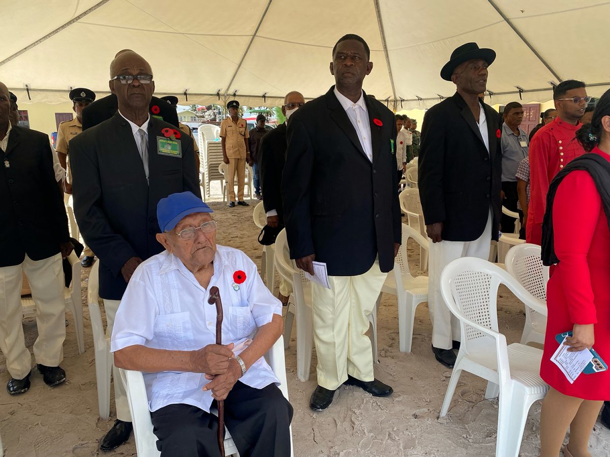 Ninety-eight-year-old Franklyn Courtman (seated) during the ceremony