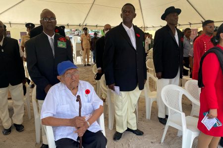 Ninety-eight-year-old Franklyn Courtman (seated) during the ceremony