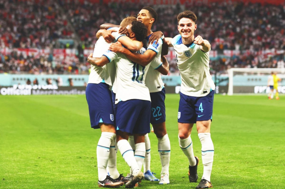 England players celebrate one of their six goals against Iran yesterday. (Photo Twitter)
