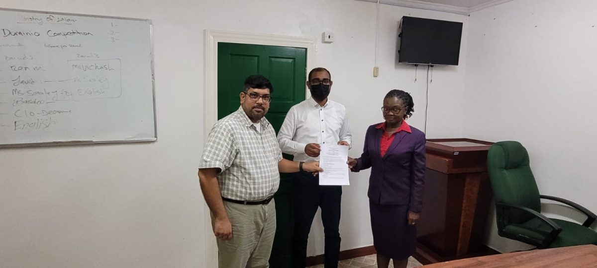 From left are GAWU General Secretary Aslim Singh,  Chief Labour officer Dhaneshwar Deonarine and Gold Board General Manager Eondrene Thompson. (GAWU photo)