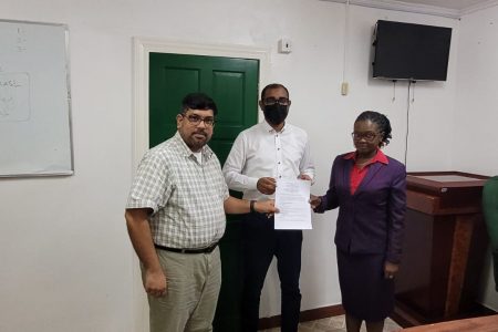 From left are GAWU General Secretary Aslim Singh,  Chief Labour officer Dhaneshwar Deonarine and Gold Board General Manager Eondrene Thompson. (GAWU photo)