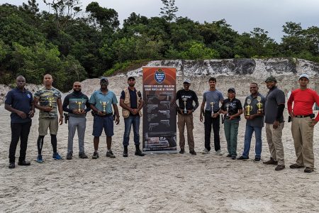 The respective divisional top three finishers in the GSSF El Dorado
Security Serve year-end championship pose with their spoils.
