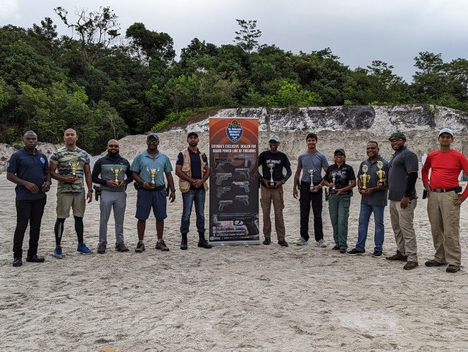 The respective divisional top three finishers in the GSSF El Dorado
Security Serve year-end championship pose with their spoils.
