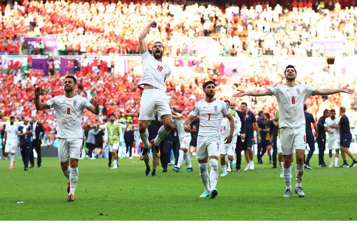  Iran players celebrate after the match REUTERS/Hannah Mckay
