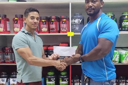 CEO of Guyana’s leading fitness supplement and gym equipment supplier, Jamie McDonald presented the Carlos Petterson-Grifith with a sponsorship pact to aid in his next international outing in New Zealand.