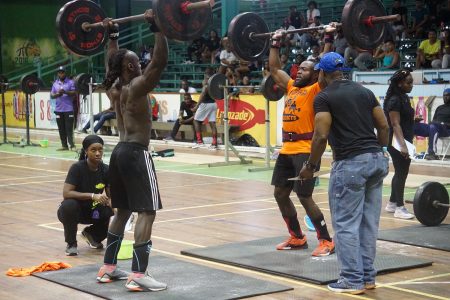 Kellon Reid (right) and his 24-year-old Fitness Addicts teammate, Omissi Williams, stood head and shoulders above the competition to pocket the $200,000 first prize. (Emmerson Campbell photo)