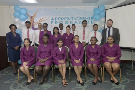 The new batch of apprentices with Managing Director, Stephen Grell (standing at right) and General Manager –Operations, Denise Hobbs (standing at left). (Republic Bank (Guyana) Limited photo) 