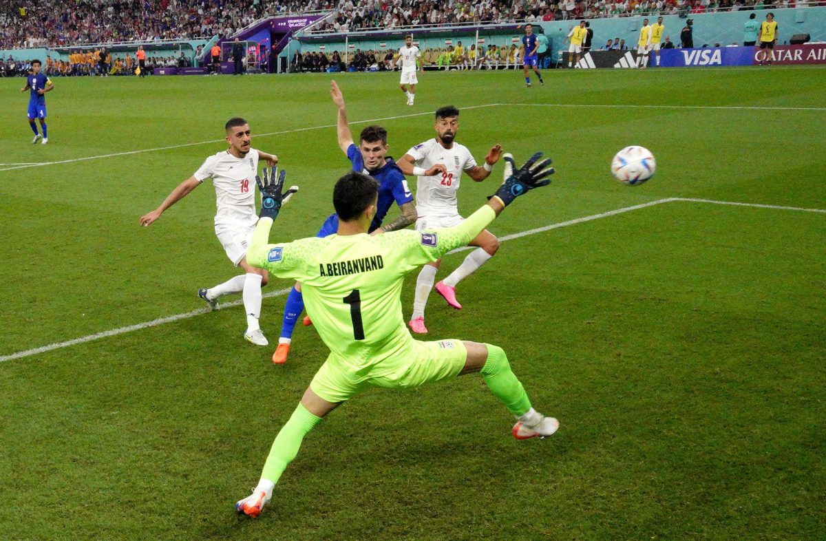 Christian Pulisic of the U.S. scores against Iran which sent his team through to the last 16.  Pool via REUTERS/Stuart Franklin