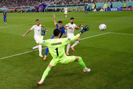 Christian Pulisic of the U.S. scores against Iran which sent his team through to the last 16.  Pool via REUTERS/Stuart Franklin