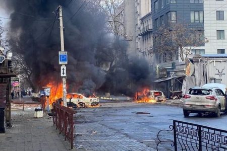 Cars burn on a street in Kherson following a Russian strike. (Reuters photo)