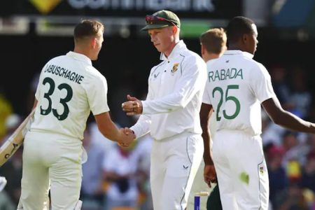 Marnus Labuschagne (left) being congratulated by South Africa’s Rassie van der Dussen following Australia’s convincing win in the 1st test match inside two days at the Gabba