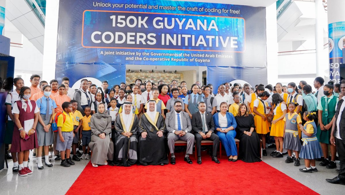 Representatives of Guyana and the UAE along with schoolchildren at the launch yesterday (Office of the President photo)