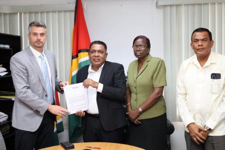 Agriculture Minister Zulfikar Mustapha (second, from left) with a representative from KARLICO INC (left) and other officials from the ministry (Ministry of Agriculture photo)