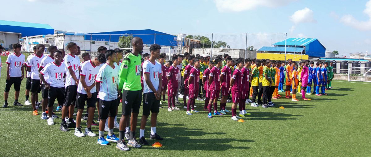 The March Past featuring all the competing teams in the KFC Goodwill Schools Football Series from left to right: SVB Academy of Suriname, DC Caesar Fox [formerly Waramadong], St. Benedict College of Trinidad and Tobago, Christianburg/Wismar, Annai Secondary, and Golden Grove